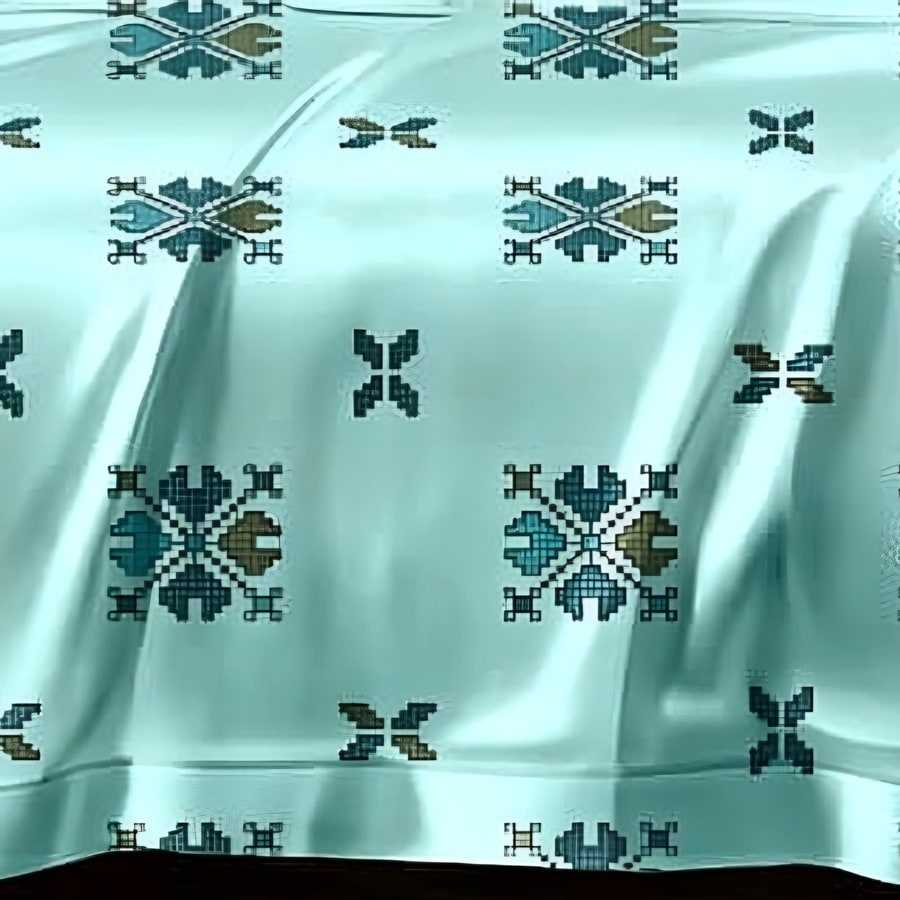Close-up of the cross-stitch motif print in Teal on aqua (AN-01)