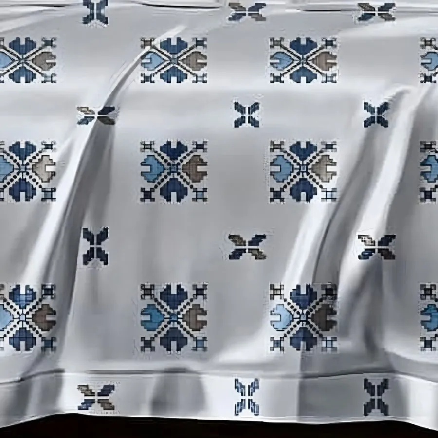 Close-up of the cross-stitch motif print in Navy on silver grey (AN-08)