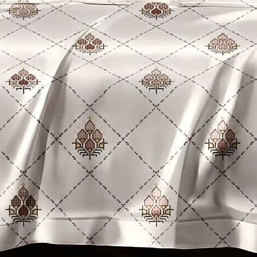 Close-up of the buta trellis print in Rose & grey on ivory (AN-10)