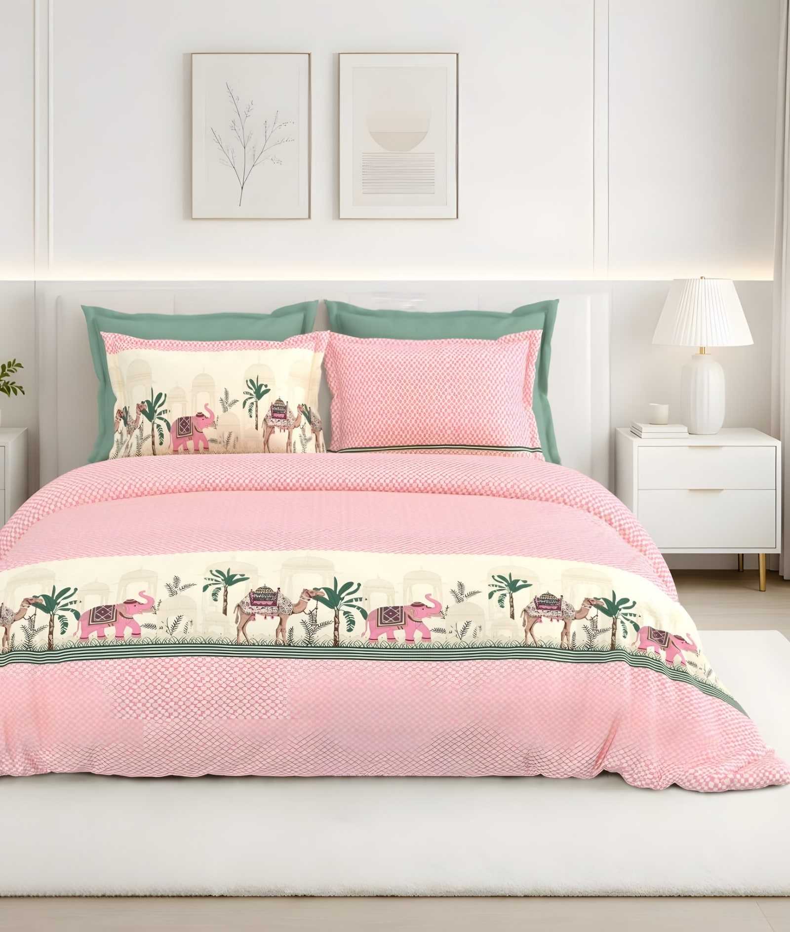 Calcium Elephant Palm Border Cotton Bedsheet Set in Pink (CA-05) on a made bed