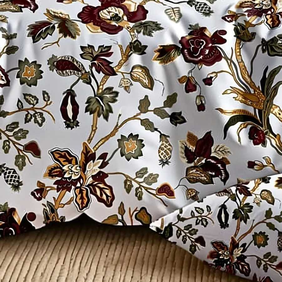 Close-up of the rose trellis print in Maroon & gold on white (DH-10)
