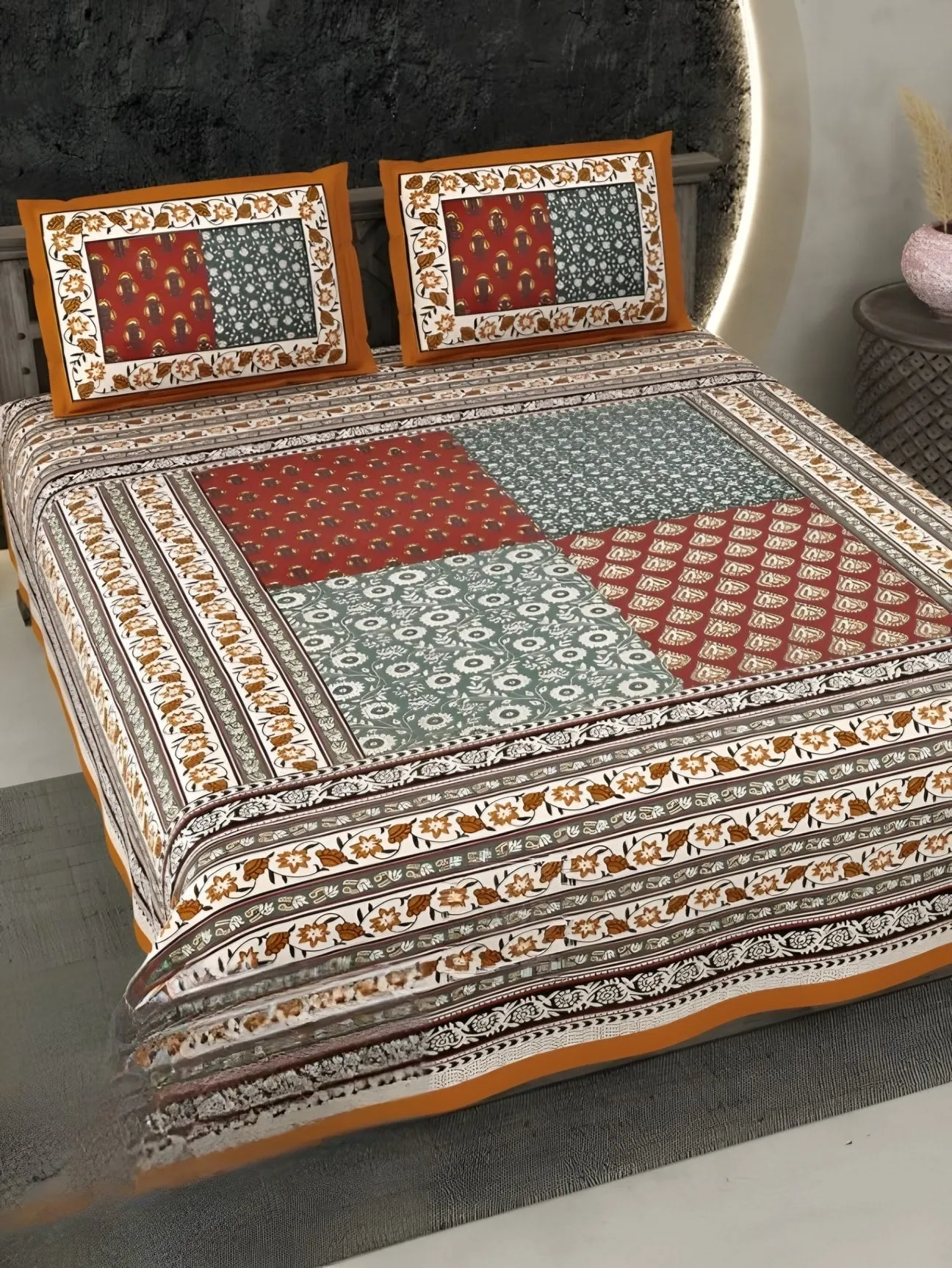 Ecuador Patch Panel Cotton Bedsheet Set in Orange & teal (EC-10) on a made bed