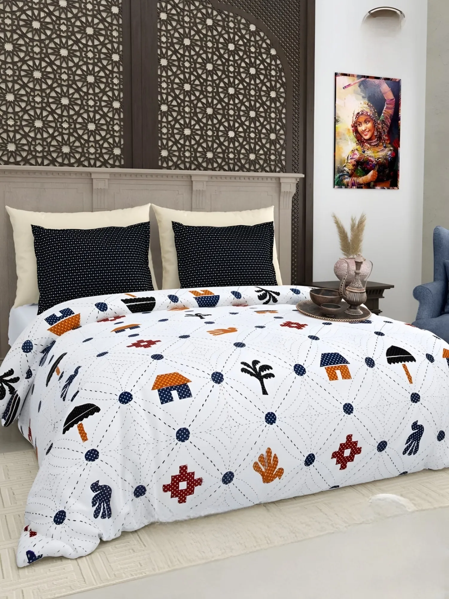 Gujri Patch Folk Icons Cotton Bedsheet Set in Navy (GP-04) on a made bed