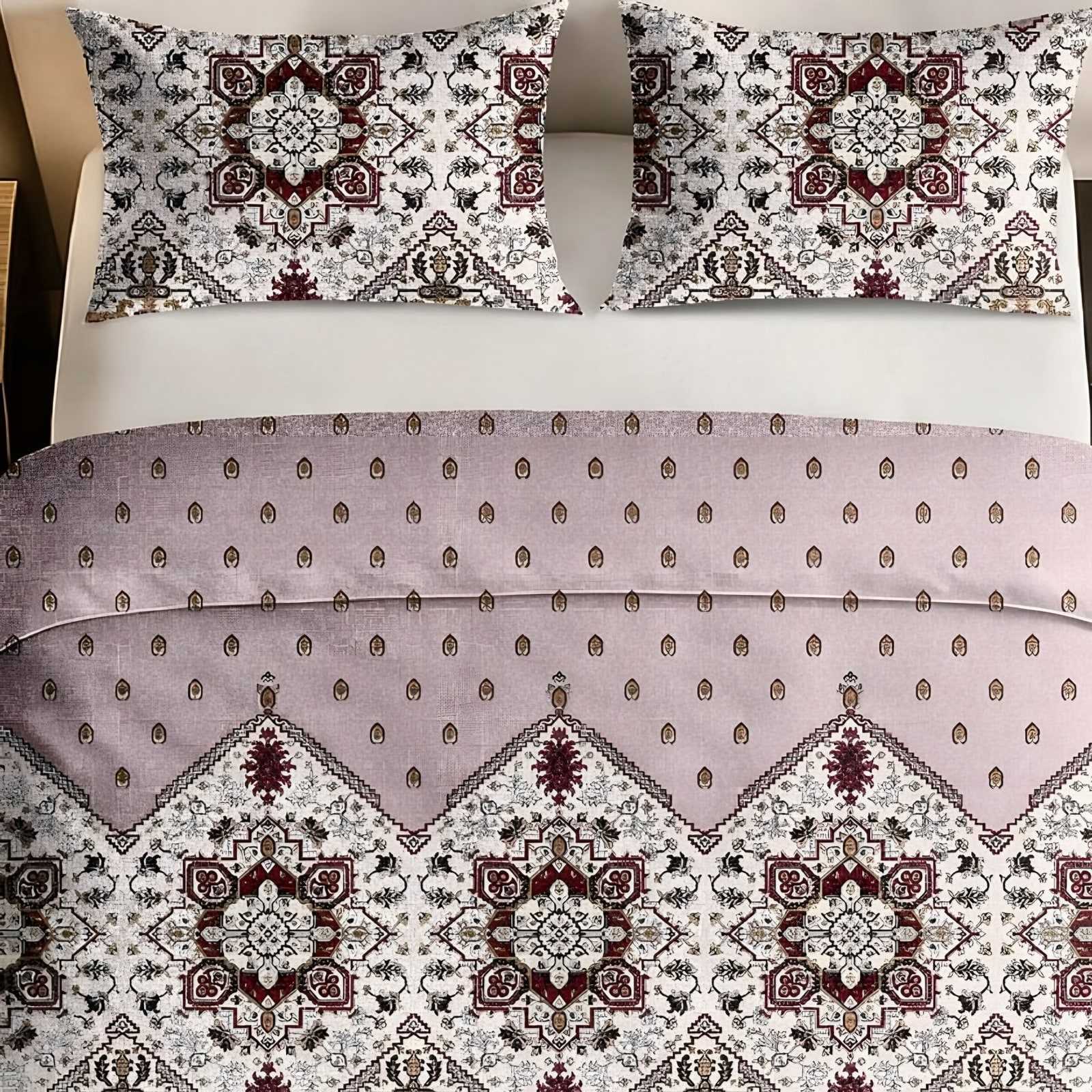 A bed made with the Italian Beauty medallion border cotton set in blush