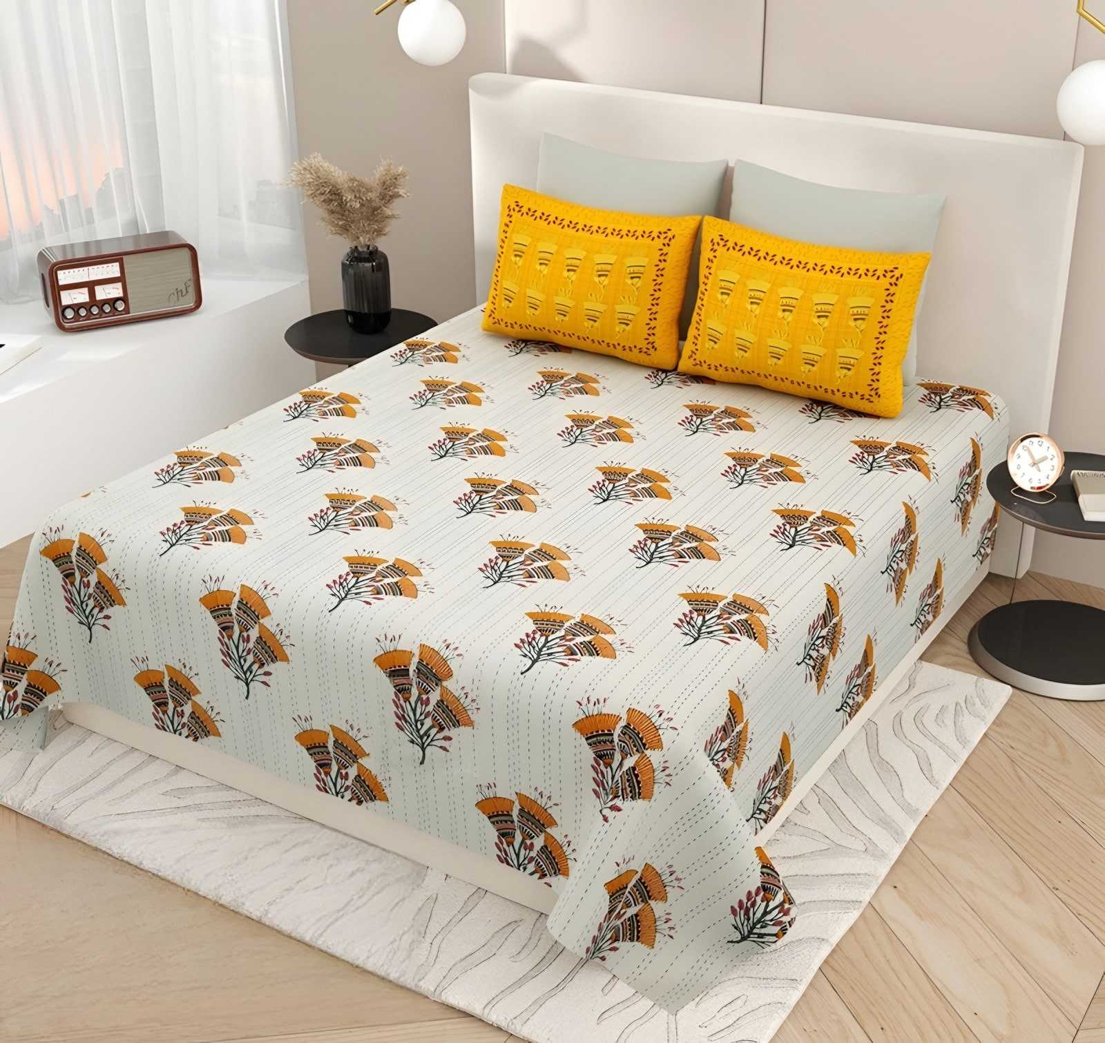 Kashida Flower Spray Cotton Bedsheet Set in Mint & mustard (KS-02) on a made bed