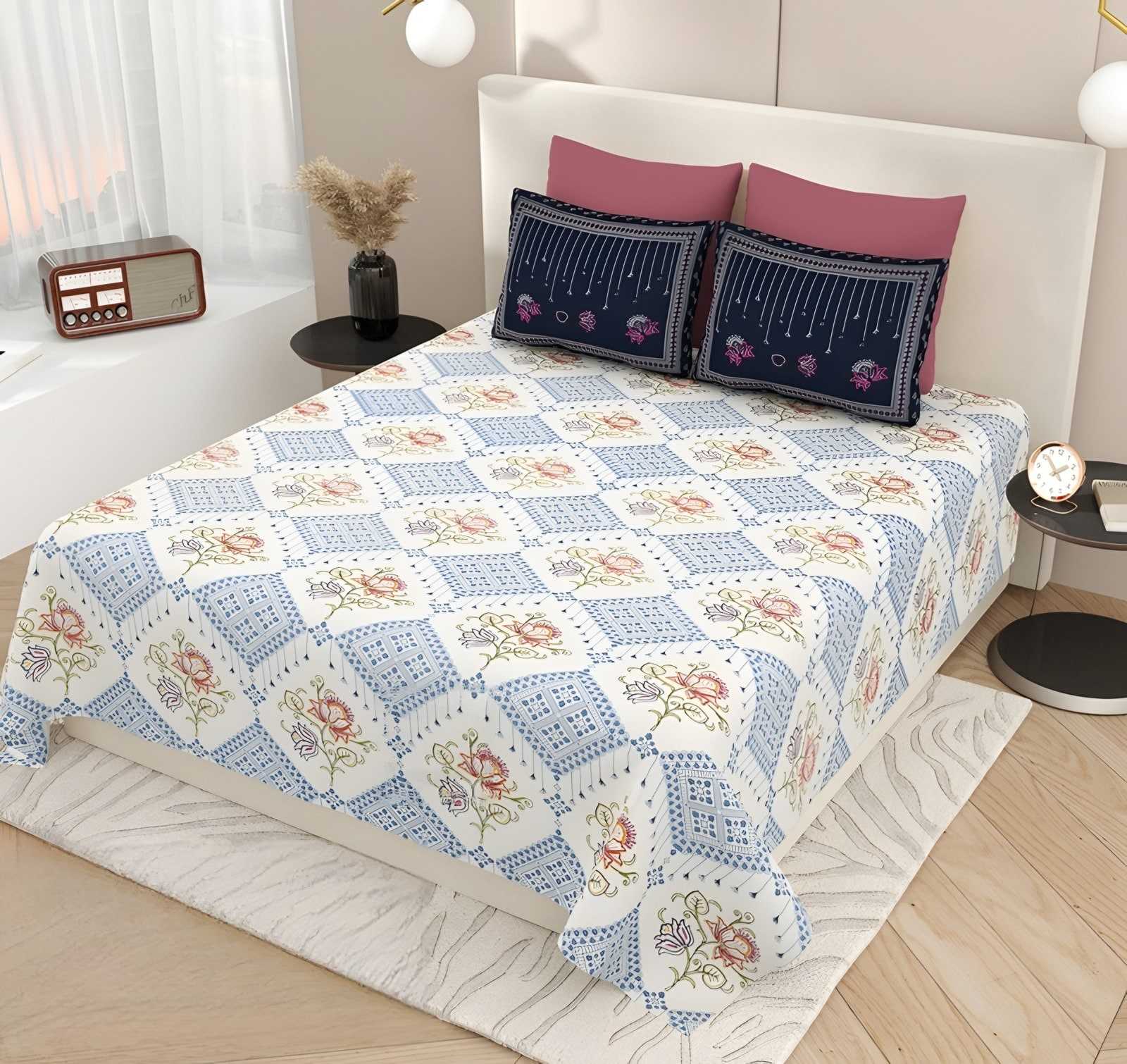 Kashida Diamond Lattice Cotton Bedsheet Set in Powder blue & navy (KS-15) on a made bed