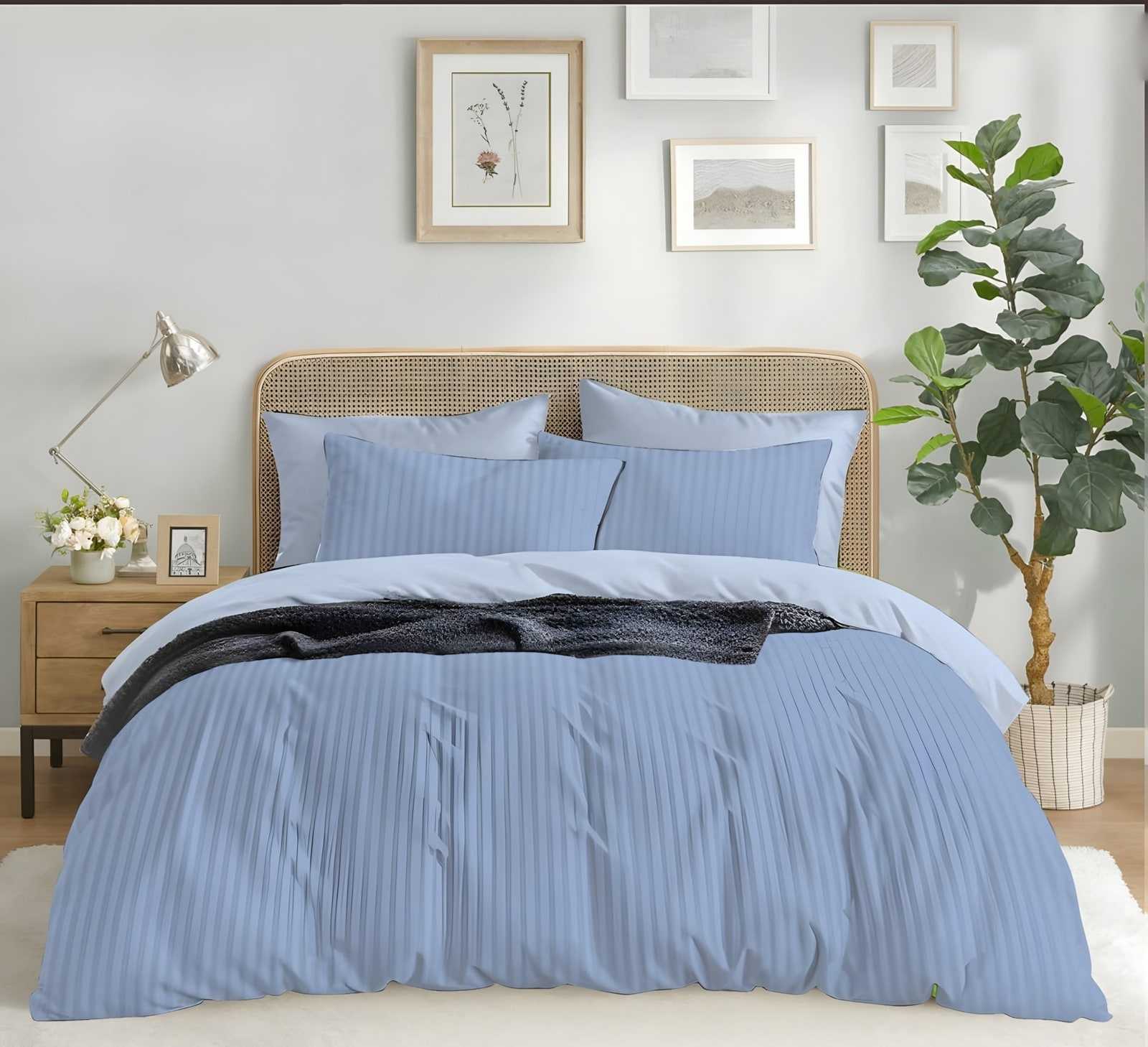 Satin stripe bedsheet set in D. Blue (ST-02) on a made bed in a bright bedroom