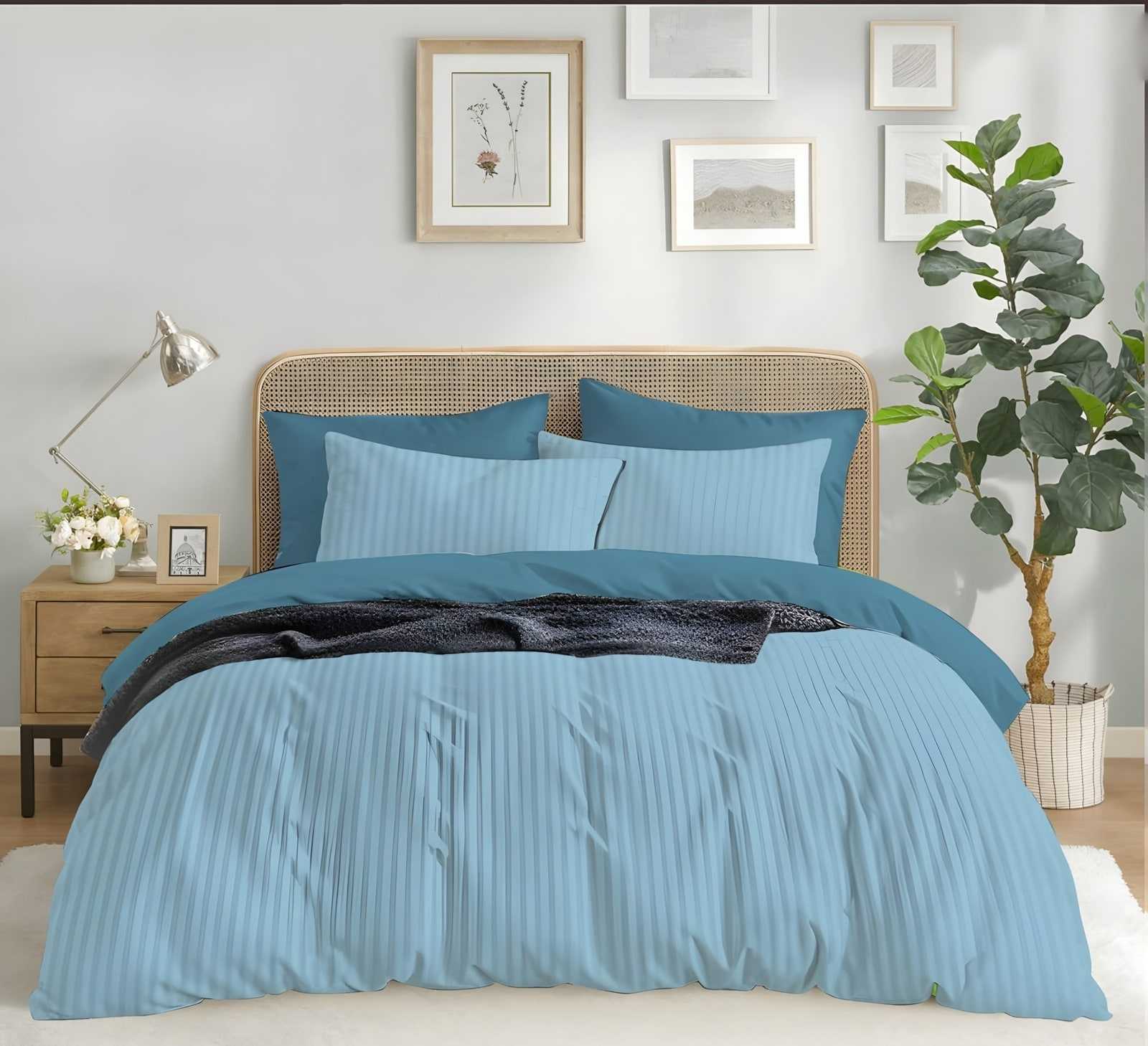 Satin stripe bedsheet set in Sky Blue (ST-05) on a made bed in a bright bedroom