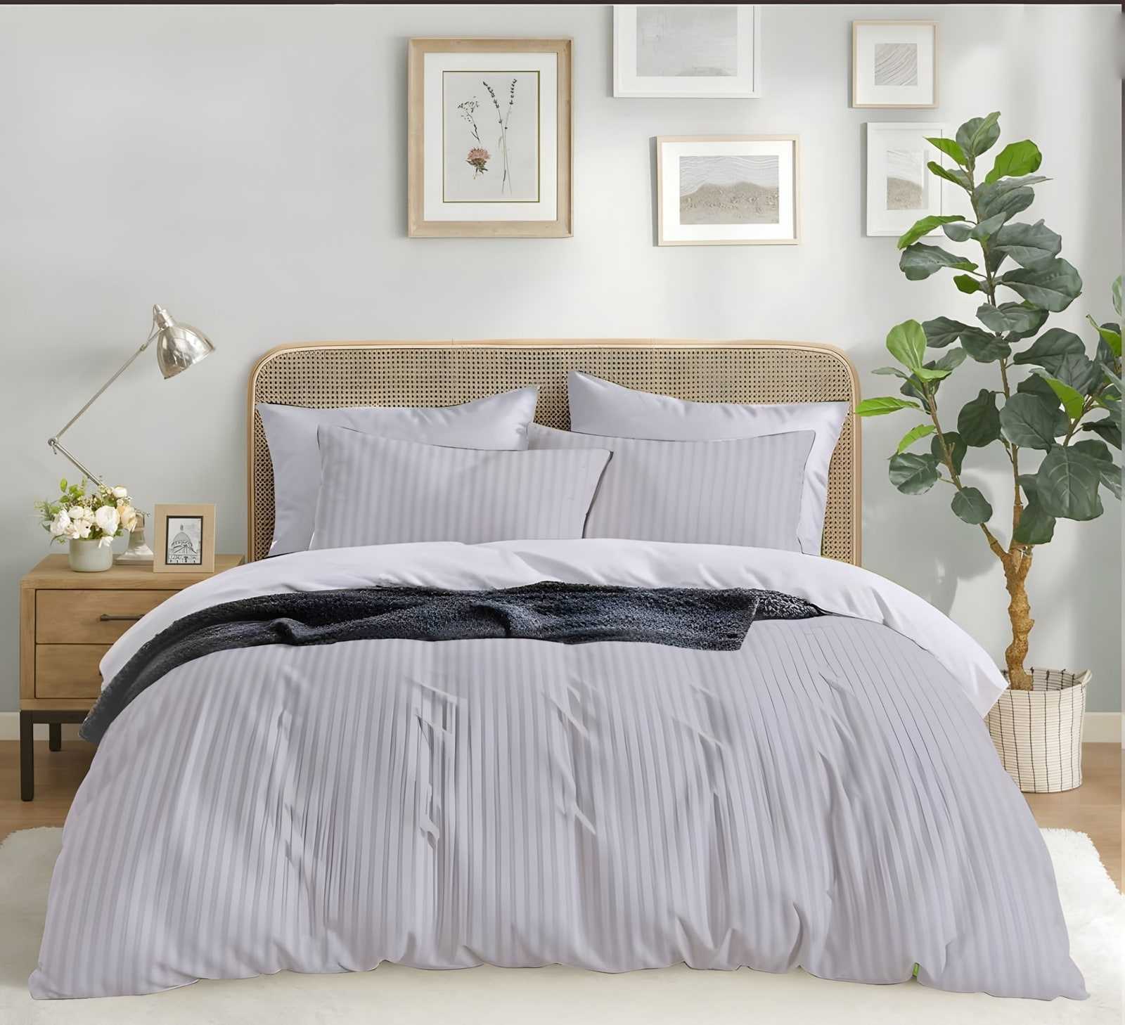 Satin stripe bedsheet set in Silver (ST-08) on a made bed in a bright bedroom