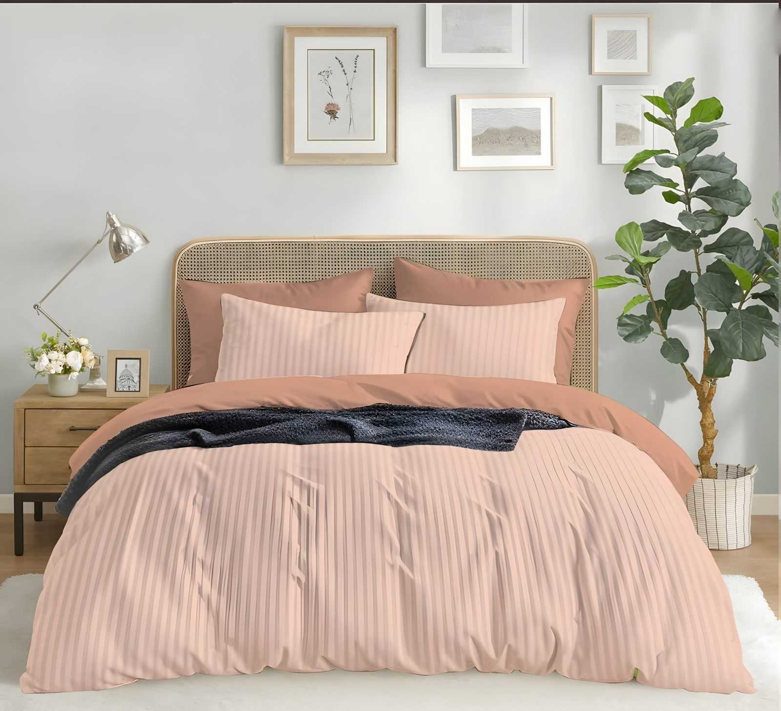 Satin stripe bedsheet set in Peach (ST-12) on a made bed in a bright bedroom
